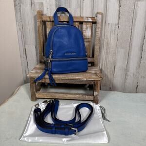 Michael Kors XS Rhea Pebbled Leather Messenger Backpack Purse Electric Blue